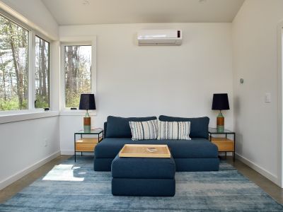 This sofa in the pool house pulls out to a full size bed, allowing for room for further accommodation.
