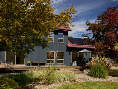 Exterior deck on the main house, with outdoor dining.