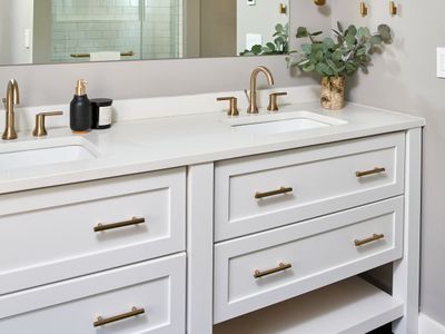The ensuite bathroom of the primary bedroom in the main house.