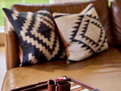 There's no shortage of games on sight, and what better place to play than the main house living room, where you can take in the views with windows on all sides.