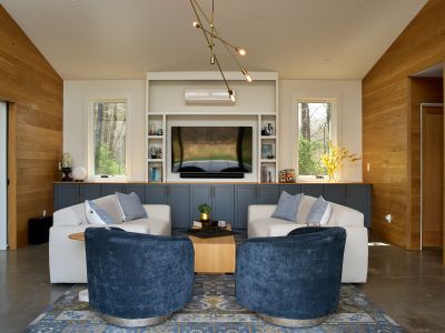 The pool house was designed for relaxed indoor-outdoor living, with huge sliding glass doors that open directly onto the pool deck.