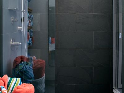 The shower room off the pool deck, perfect for a rinse after swimming.