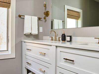 The ensuite bathroom of the primary bedroom in the main house.