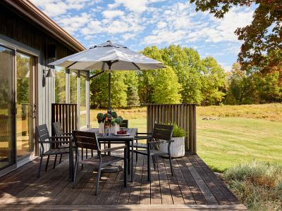Al fresco dining, just outside the main house kitchen and easily accessed through oversized glass doors.