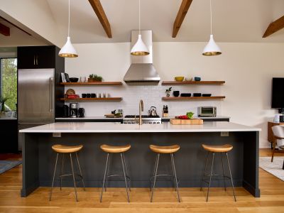 Oversized island with counter seating in the main house kitchen.