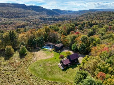 5 acres of property, surrounded by meadows, mature trees and the Shawangunk mountain range.