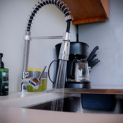 Kitchen essentials provided, including coffee maker and cooking utensils.