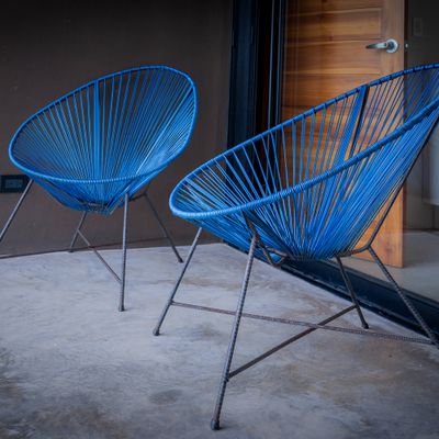 Outdoor lounge chairs on the private terrace, perfect for relaxing.