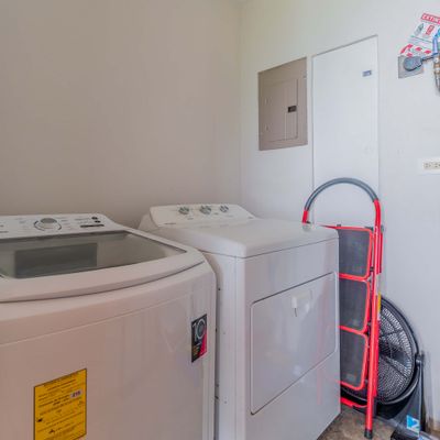 An in-unit washer and dryer make longer stays easy and convenient.