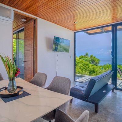 Enjoy a bright indoor space that opens to the terrace and frames beautiful Pacific views.