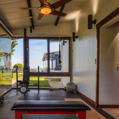 In-home exercise-fitness room.
