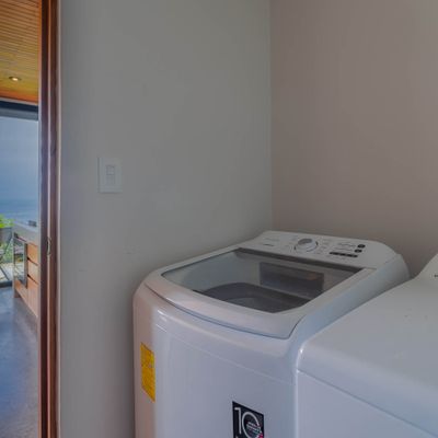 An in-unit washing machine adds extra convenience for extended stays.
