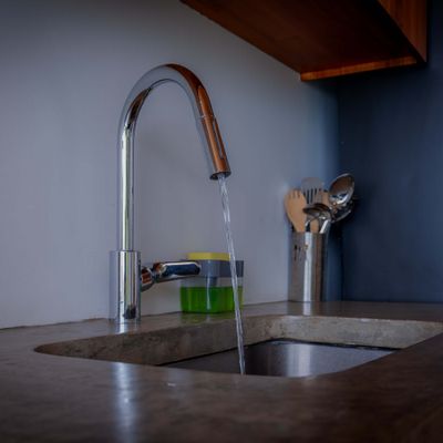 Modern kitchen fixtures and essentials make everyday use easy and practical.