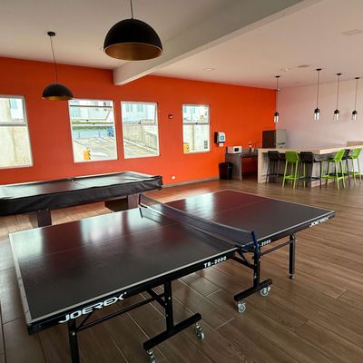 A pool table and ping pong table are available to play.