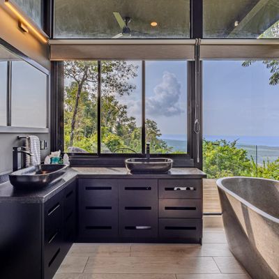 En suite bathroom for Bedroom #3 with ocean and jungle views.