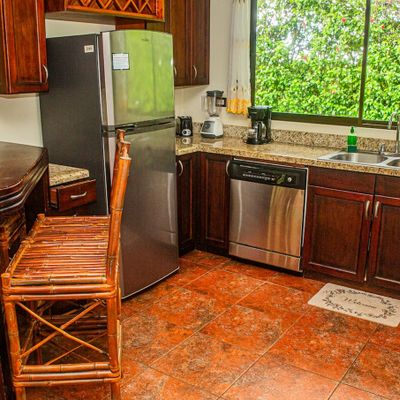 A warm kitchen with wood accents and a homey, inviting atmosphere.