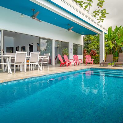 sparkling, crystal-clear pool, ideal for sunbathing and enjoying the outdoors.