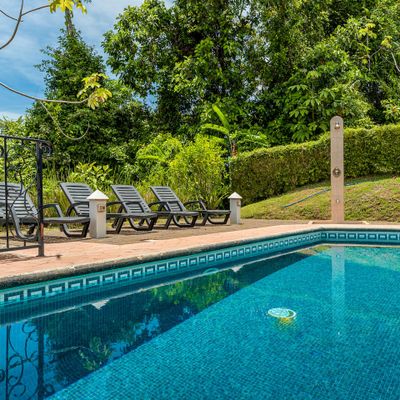 spacious pool offering plenty of room for everyone to enjoy.