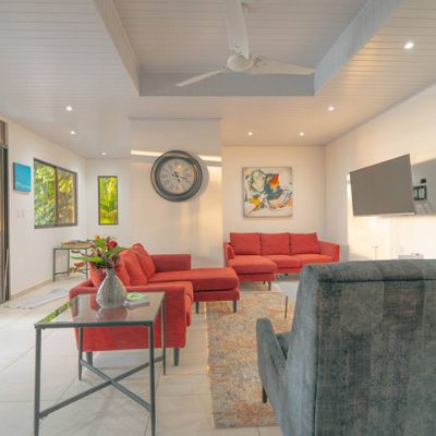 An elegant living room with a minimalist design, neutral tones, and inviting ambiance.