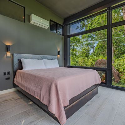 Bedroom #3 has uninterrupted views of the ocean and the jungle.