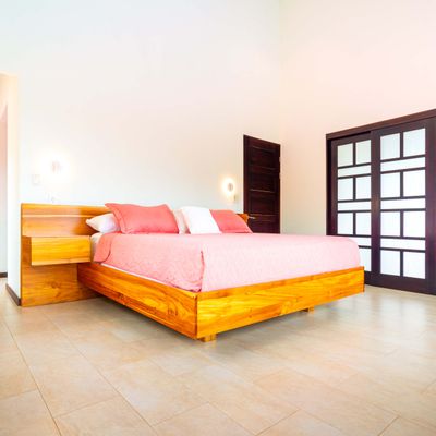 Owner's Suite is spacious, has a king-size bed, A/C, TV, en-suite/private bathroom.