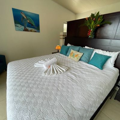 Owner's Suite has king-size bed, en suite bathroom, private balcony.