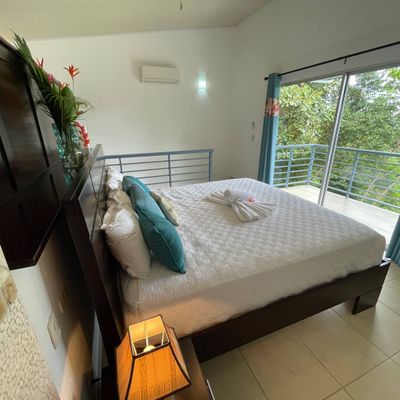 Owner's Suite has king-size bed, en suite bathroom, private balcony.