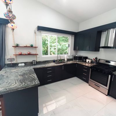 An elegant kitchen with contemporary finishes, designed for both style and function.