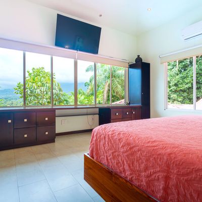 Owner's Suite is spacious, has a king-size bed, A/C, TV, en-suite/private bathroom.