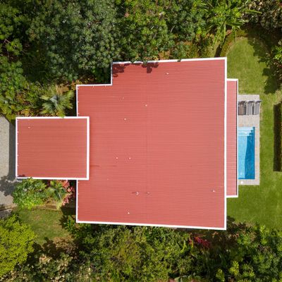 Different angles of the house’s exterior, emphasizing its elegant details and surroundings