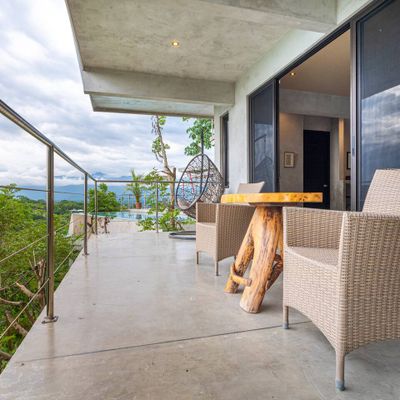 calming space to appreciate the outdoors, surrounded by lush greenery and fresh air.