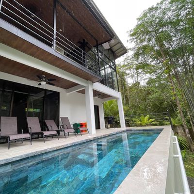 swimming pool set against the backdrop of breathtaking natural scenery.