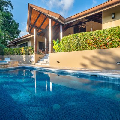Large swimming pool with smaller plunge pool for sitting and relaxing