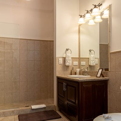 well-lit, elegant bathroom that enhances its modern design.