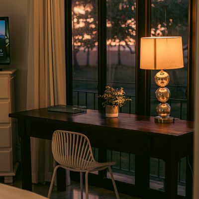 Master bedroom with a view of the garden and stunning sunsets.