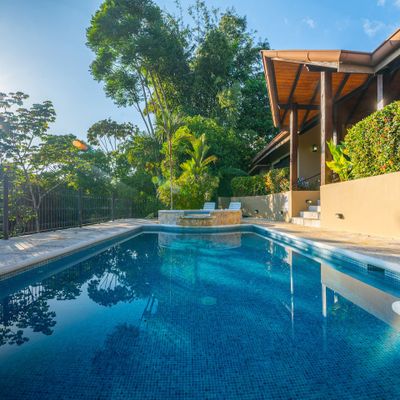 Large swimming pool with smaller plunge pool for sitting and relaxing