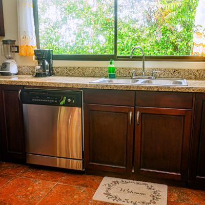 pacious kitchen with ample room for cooking and storage, perfect for preparing meals