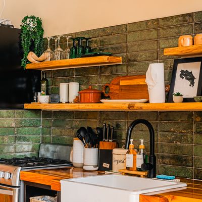 A sleek, modern kitchen with high-end finishes and stylish appliances.