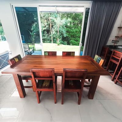 A sleek dining table, perfect for family meals or elegant dinner parties.
