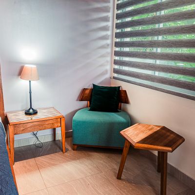 Cozy reading nook by the window, perfect for quiet moments.