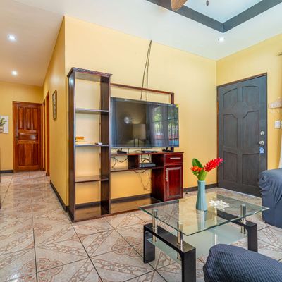 TV and A/C in the living room.