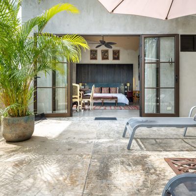 Penthouse level with jacuzzi, sun chairs and Suite #2.
