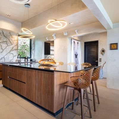 A contemporary kitchen with refined details and a luxurious, streamlined look.