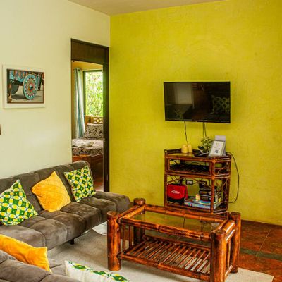 spacious living room features a smart TV, creating the ideal space for enjoying movies, shows, and streaming content with ease