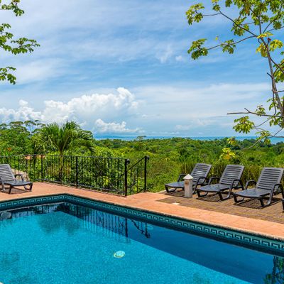 spacious pool area, perfect for swimming and relaxation.