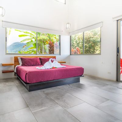 Suite #1 has ocean views, mountain views, access to the private pool, along with en-suite bathroom, air conditioning and ceiling fan.