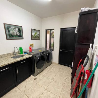 Laundry room is inside the main house - Washer and dryer are free to use and we provide liquid detergent and basic cleaning supplies during your stay