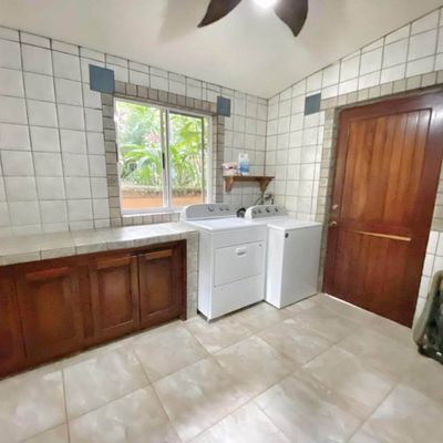 Laundry is in the home and free to use.