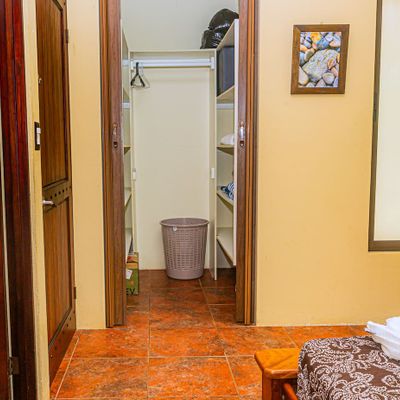 A bright, functional room with a large wardrobe for a clean and organized space.