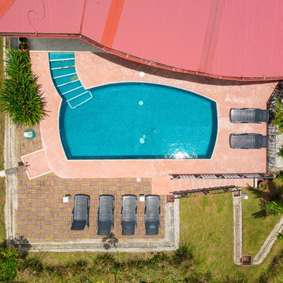 A pristine pool with crystal-clear water, offering a serene and inviting atmosphere.